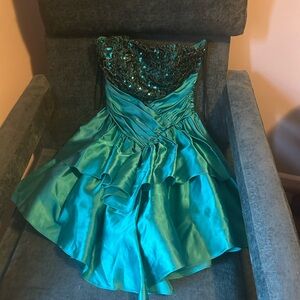Blue Graphic T-Shirt /Teal satin strapless dress with black sequin detail .